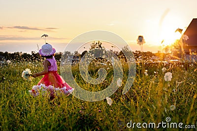 Child in a flower field