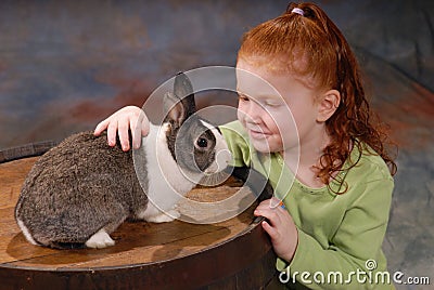 Child with Pet Rabbit