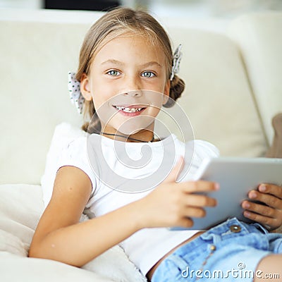 Child playing on tablet pc