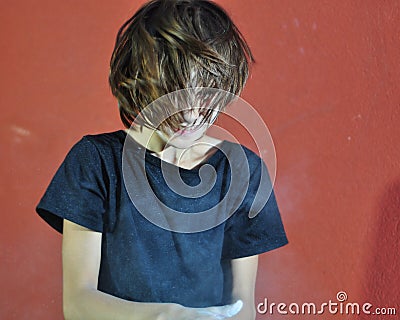Child with powder chalk magnesium preparing for gym