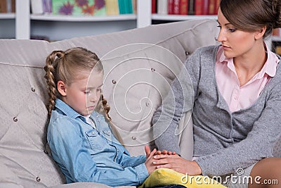 Child psychologist with a little girl