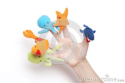 Child s hand playing with finger puppets