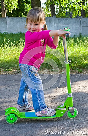 Child on scooter