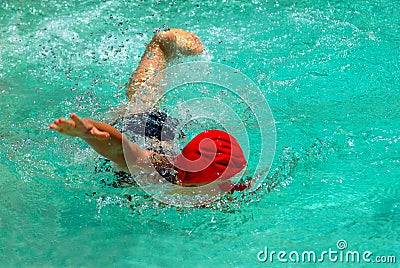 Child swimming freestyle