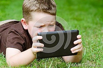 Child using tablet computer