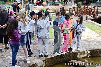 Children at the age of seven or eight playing in an amusement park