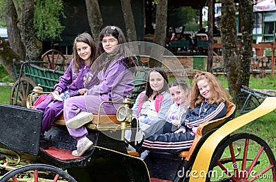 Children at the age of seven or eight playing in an amusement park