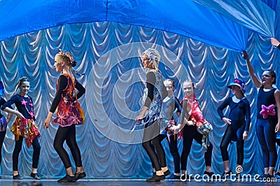 Children dancing on stage