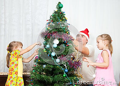 Children Decorate The Christmas Tree Royalty