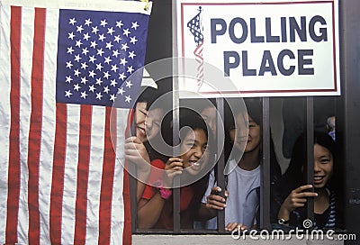 Children at the entrance to a polling place,