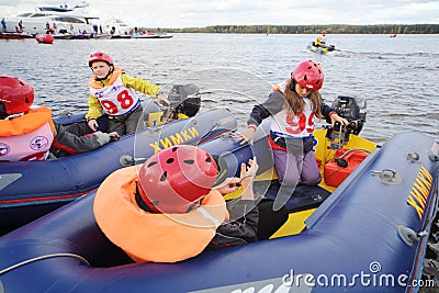 Children in inflatable boats at Powerboat Race Show 2012