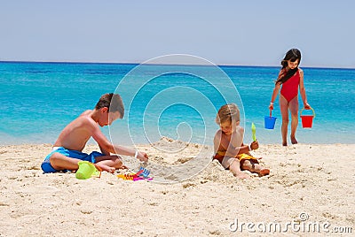 Children play at island beach