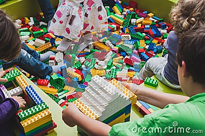 Children play with Lego bricks in Milan, Italy