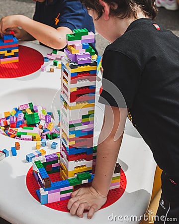 Children play with Lego bricks in Milan, Italy