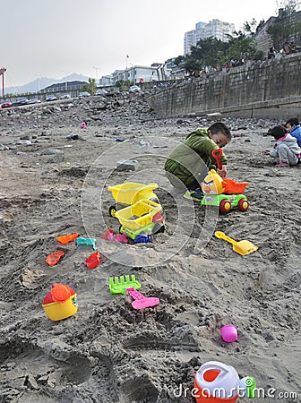 Children play with sand