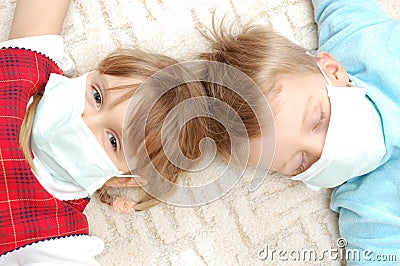 Children with pretection flu mask