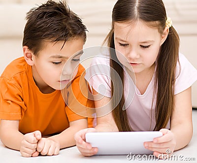 Children using tablet computer