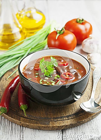 Chili soup with red beans and greens