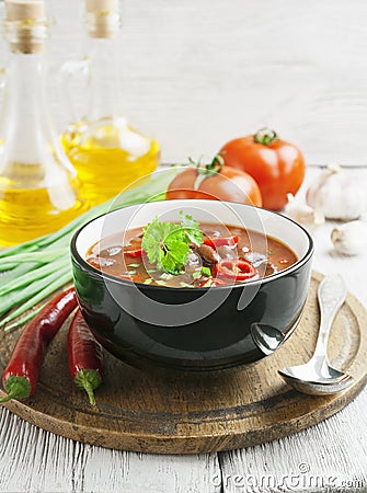 Chili soup with red beans and greens