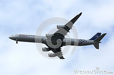 China Eastern Airbus A340 in New York sky before landing at JFK Airport