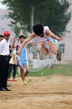 China: Student Track and Field Games / long jump