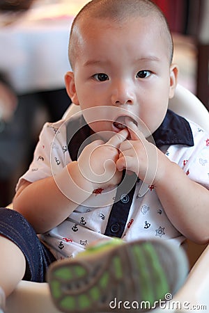 Chinese baby sucking finger