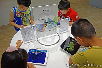 Chinese child playing ipad