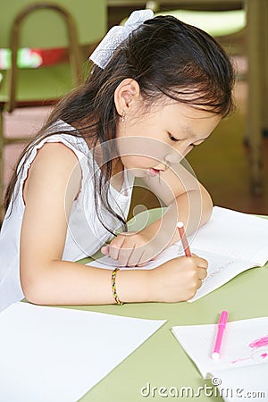 Chinese girl learning to write