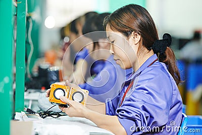 Chinese male worker at manufacturing