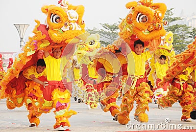 Chinese people playing lion dance