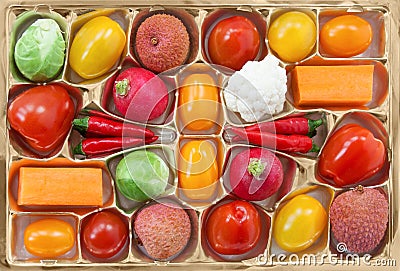 Chocolate box with vegetable and fruit contents