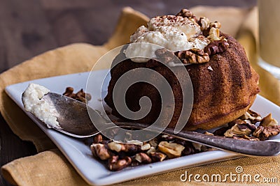 Chocolate orange cake with butter cream and toasted walnuts