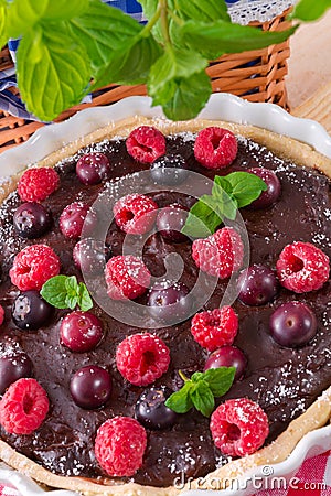 Chocolate tartelette with forest fruits