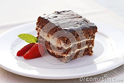Chocolate and vanilla cake with strawberries
