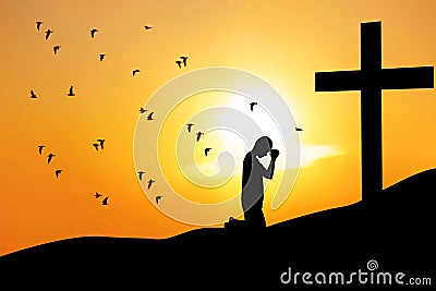 Christian background: man praying under the cross