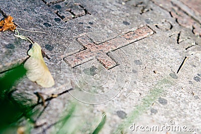 Christian Grave Marker in Cemetery