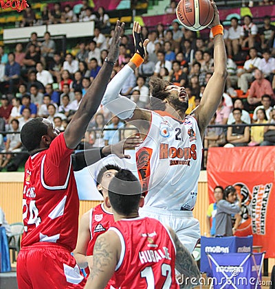 Christien Charles #21 rebound ball compete with Justin Williams #27 in an ASEAN Basketball League