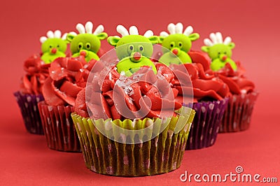 Christmas cupcakes with fun and quirky reindeer faces - selective focus