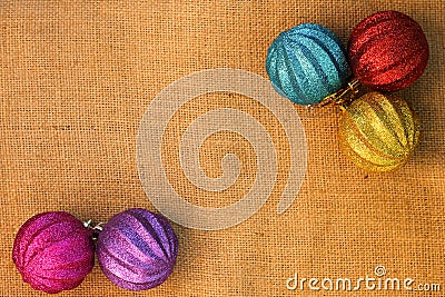 Christmas decorations balls on background sacks