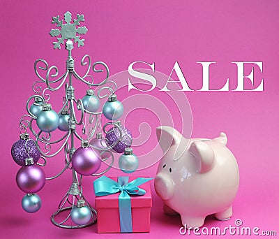 Christmas Sale still life with pastel pink and blue, with silver Christmas Tree and baubles