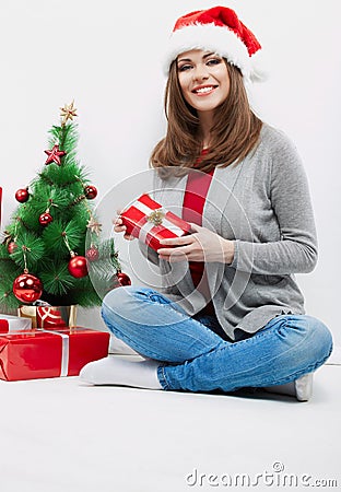 Christmas Santa hat isolated woman portrait hold christmas gift.
