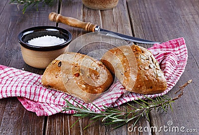Ciabatta bread on rustic wooden background