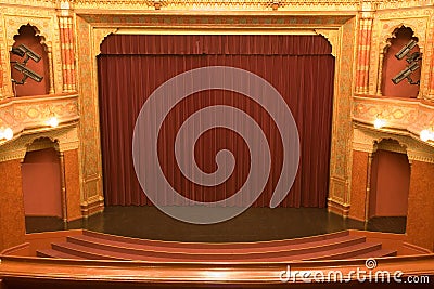 Cinema stage with red curtains
