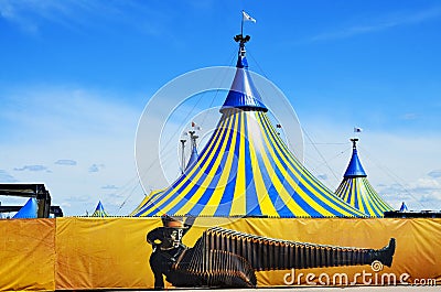 Cirque du Soleil yellow and blue tent