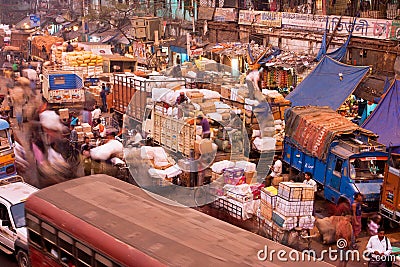 City cars and people on market street of India