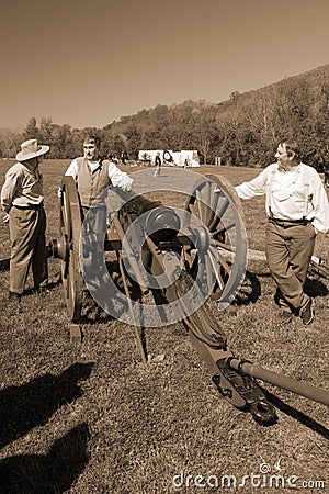 Civil War Reenactors by a Cannon