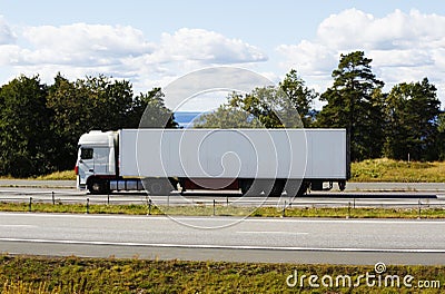 Clean white truck in motion
