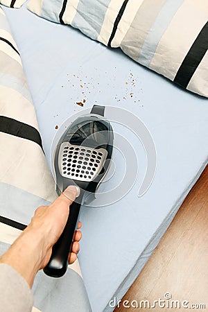 Cleaning bed with vacuum cleaner