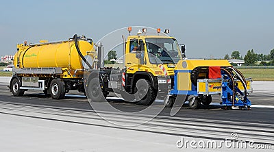 Cleaning of the runway at the airport