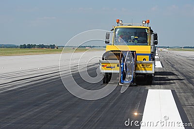 Cleaning of the runway at the airport